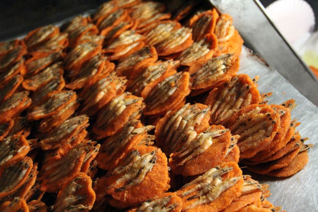 closeup of pastry items on a silver surface