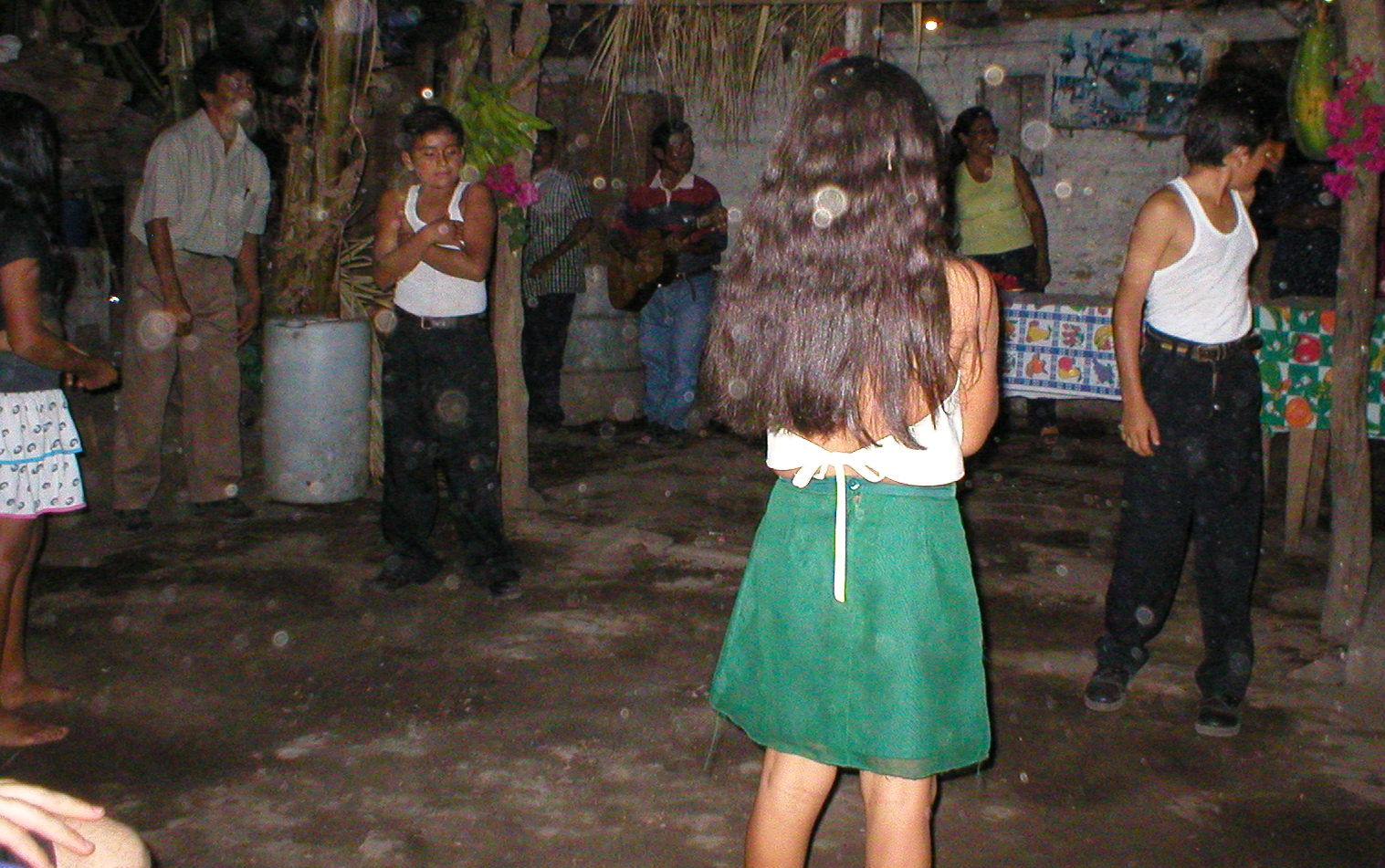 a group of people gathered around playing a game