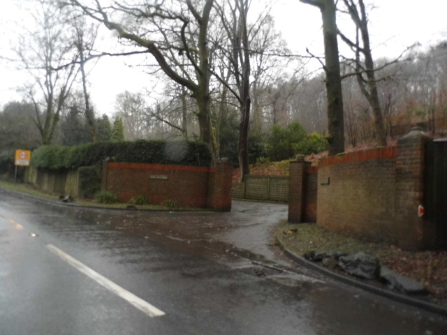 a wet street with a couple of gates on each side