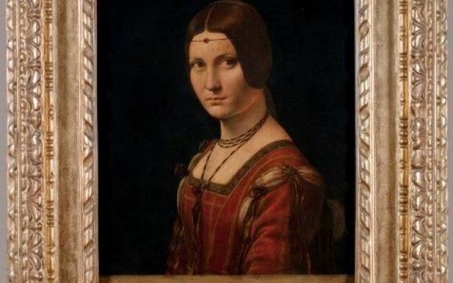 a portrait of a woman wearing red and a brown dress