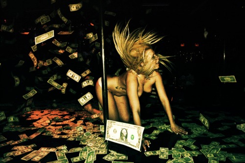 a woman in bikini with a lot of money