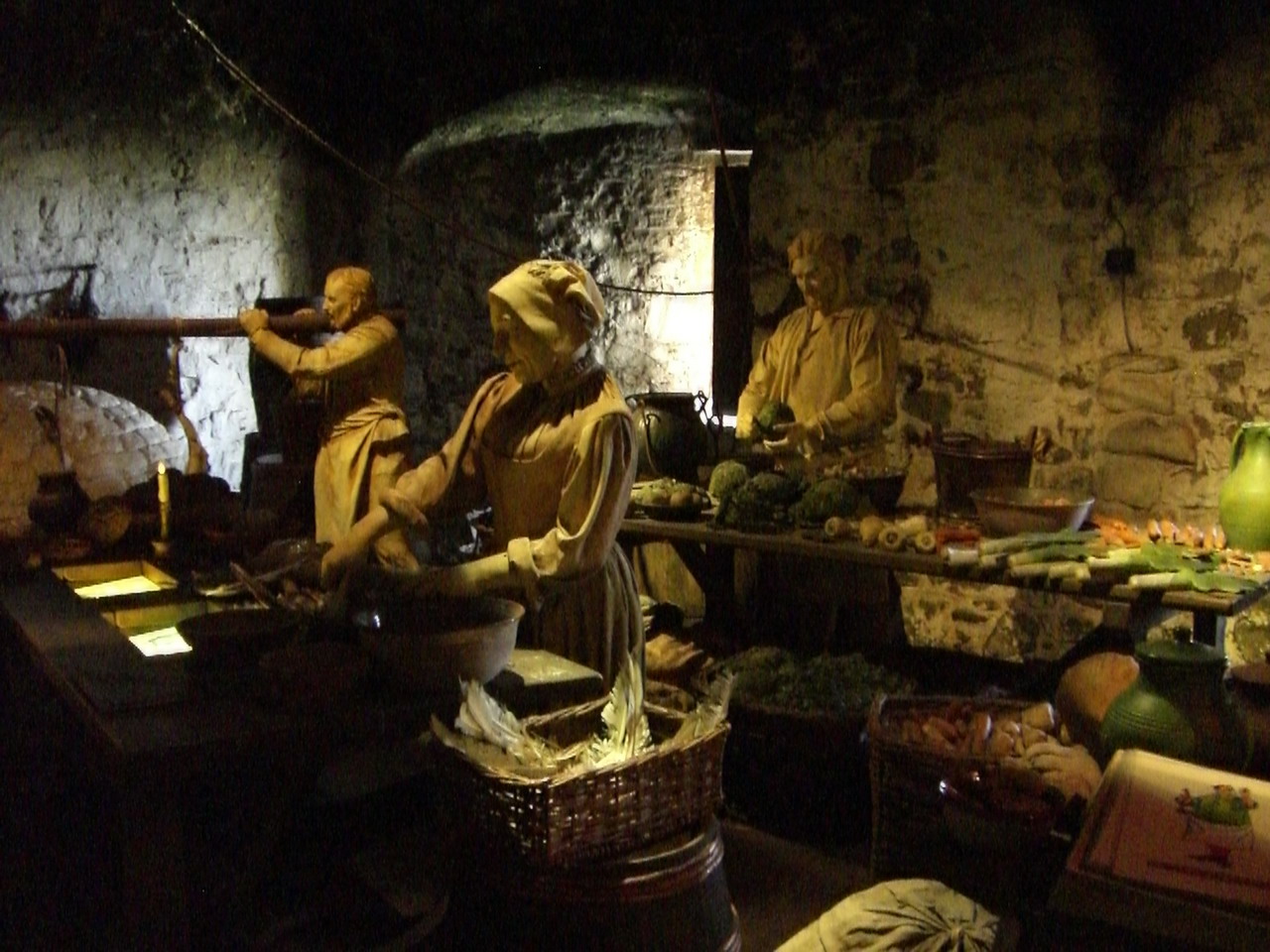 a po of some statues of monks, including one sitting