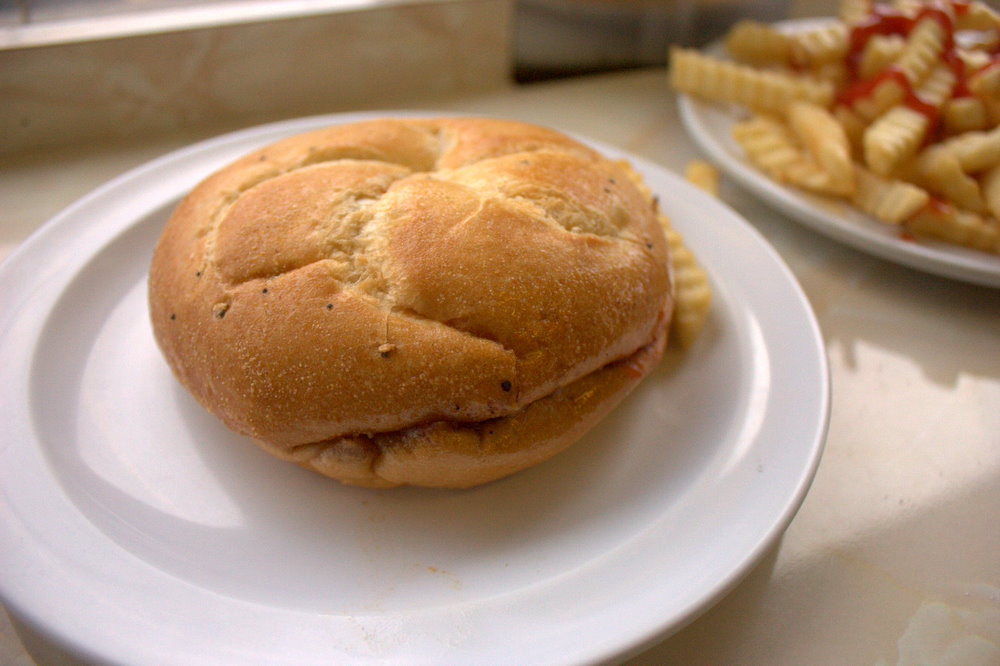 a sandwich and french fries on a plate