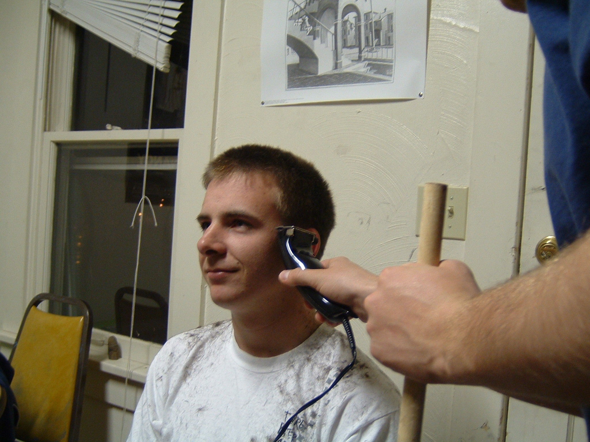 a young man getting ready to record the music on his phone