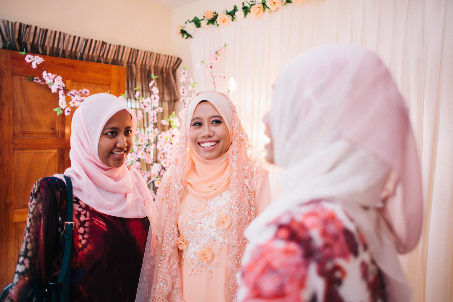 two women wearing hijab standing near each other