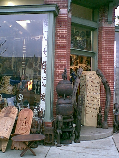 many furniture are outside of a shop front