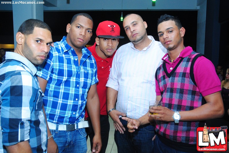 several young men are posing together at a party