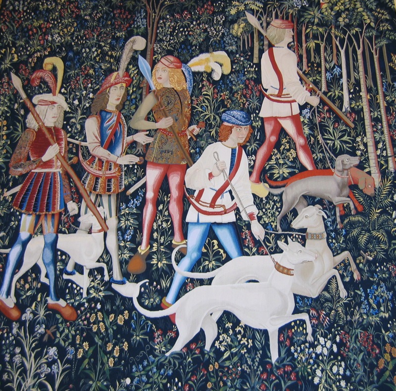 an artistic wall painting with many different people and dogs