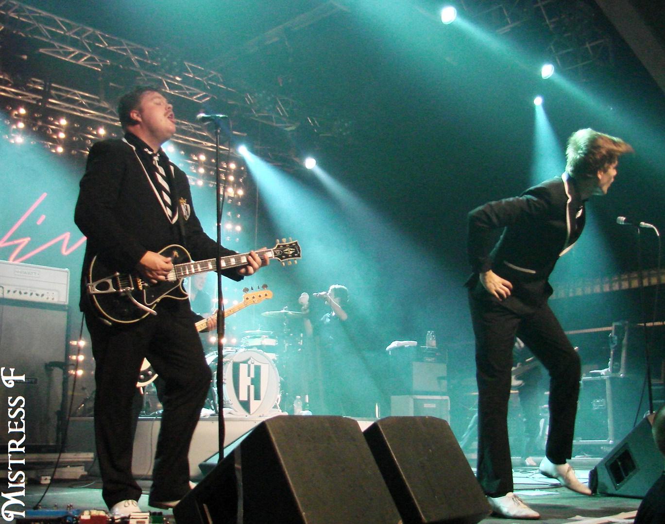 the young band perform on stage at an event