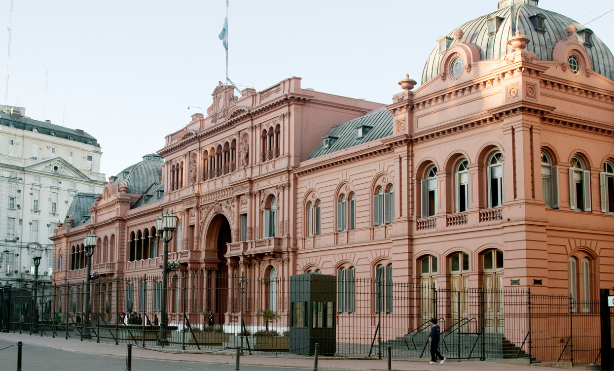 a building with a statue next to it