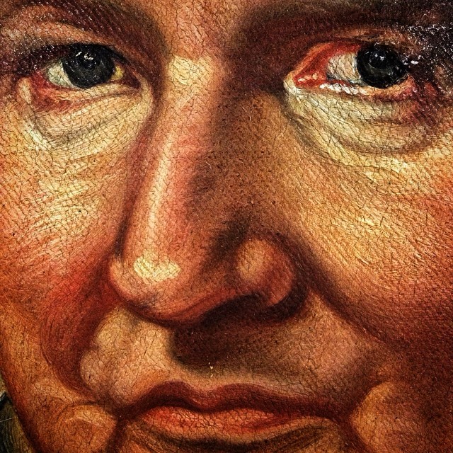the eyes and nose of the painted painting man
