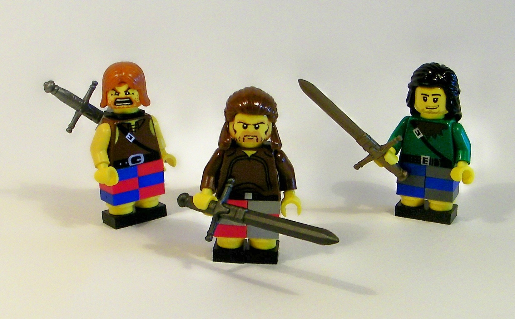 a lego figure set with four different kinds of people