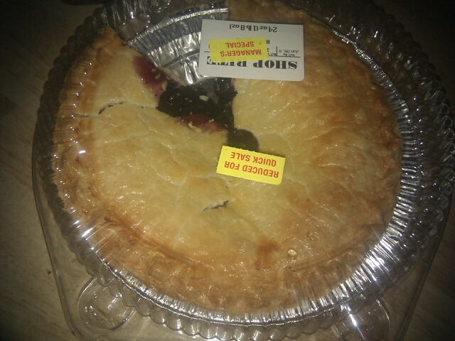 a large pie that has several pieces missing