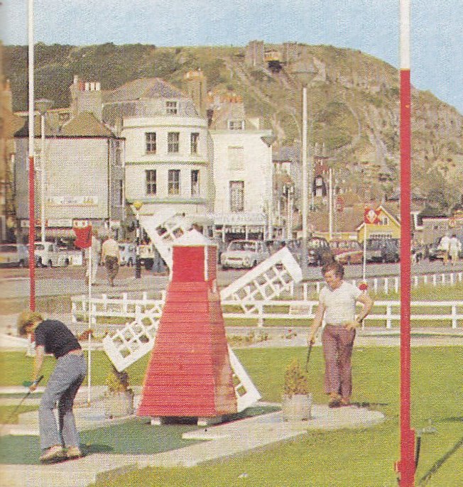 a group of people are fixing some type of tower