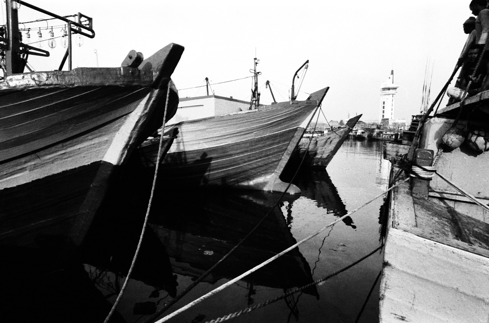 some boats that are sitting in the water