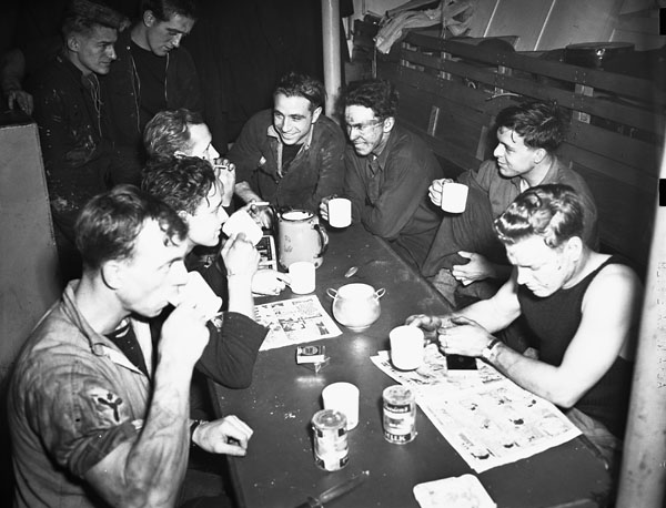 a group of men at a table playing a game