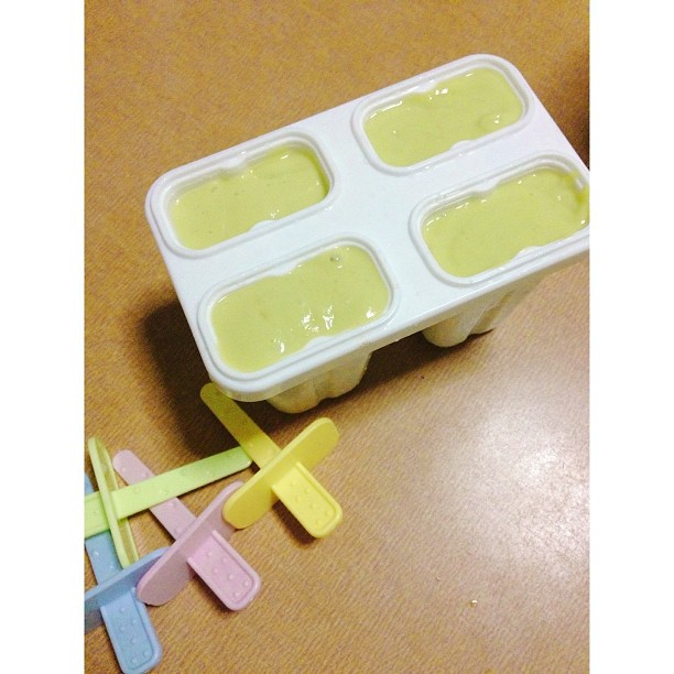 a tray of food on a wooden surface