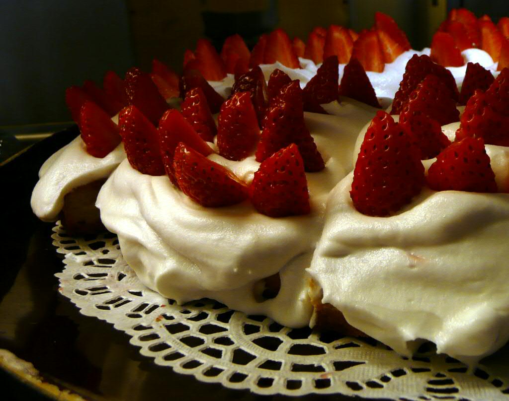 a desert that has sliced strawberries on it