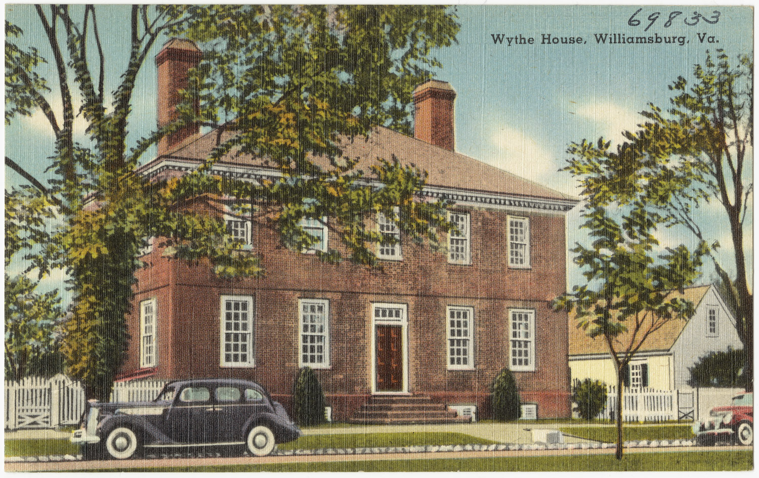 a vintage postcard shows a house with a classic car in front