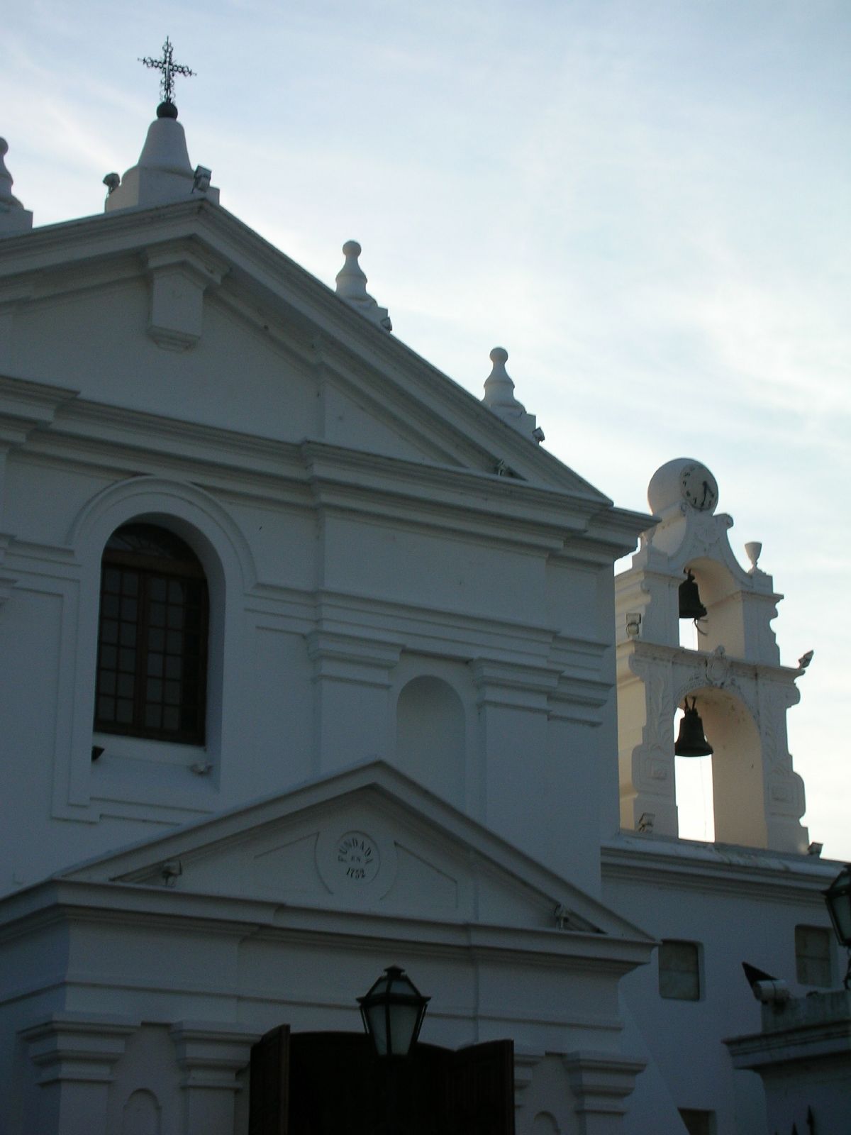 an old church with a clock on it