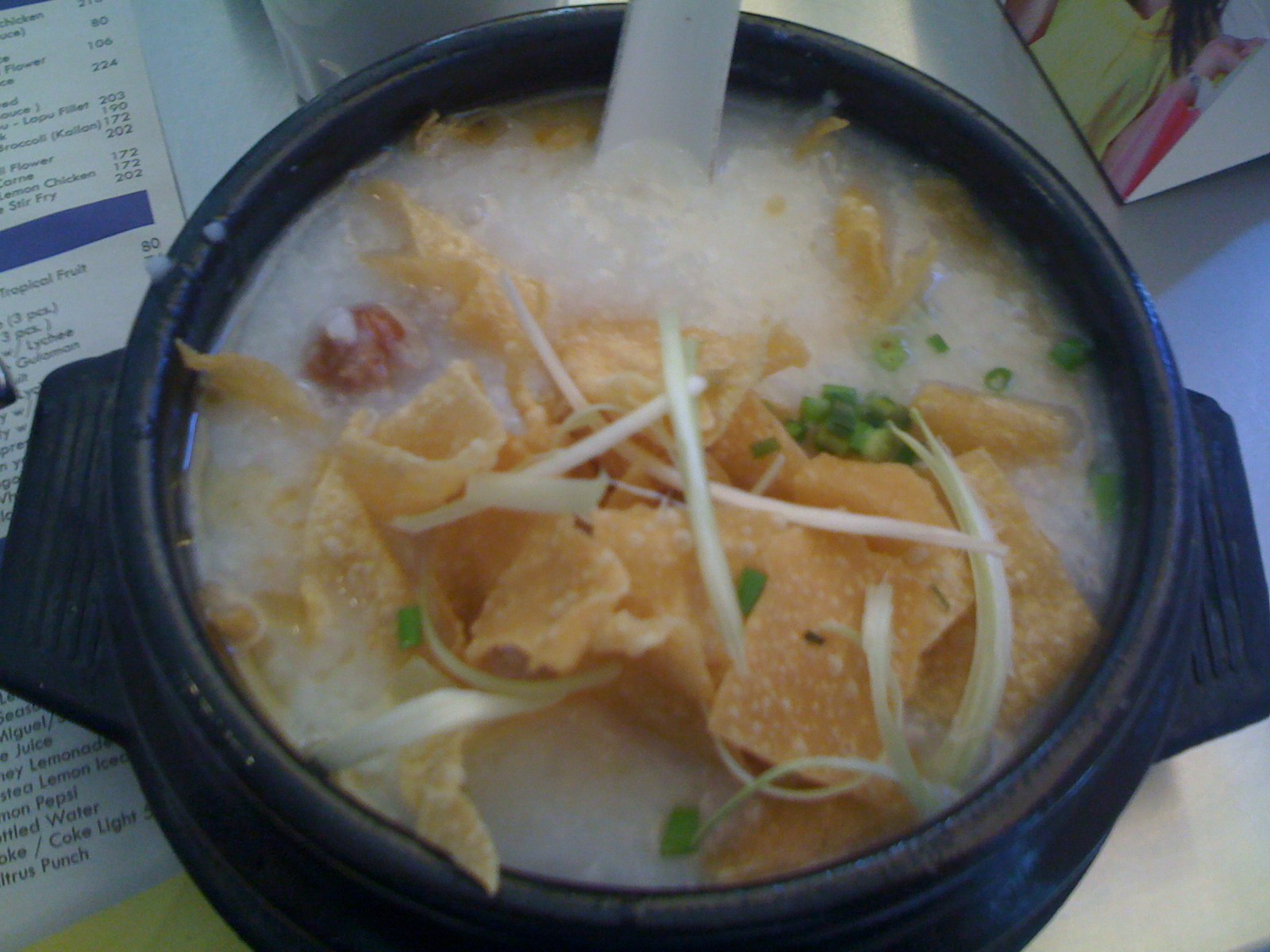 soup with cereal garnished with sour cream and sour cream