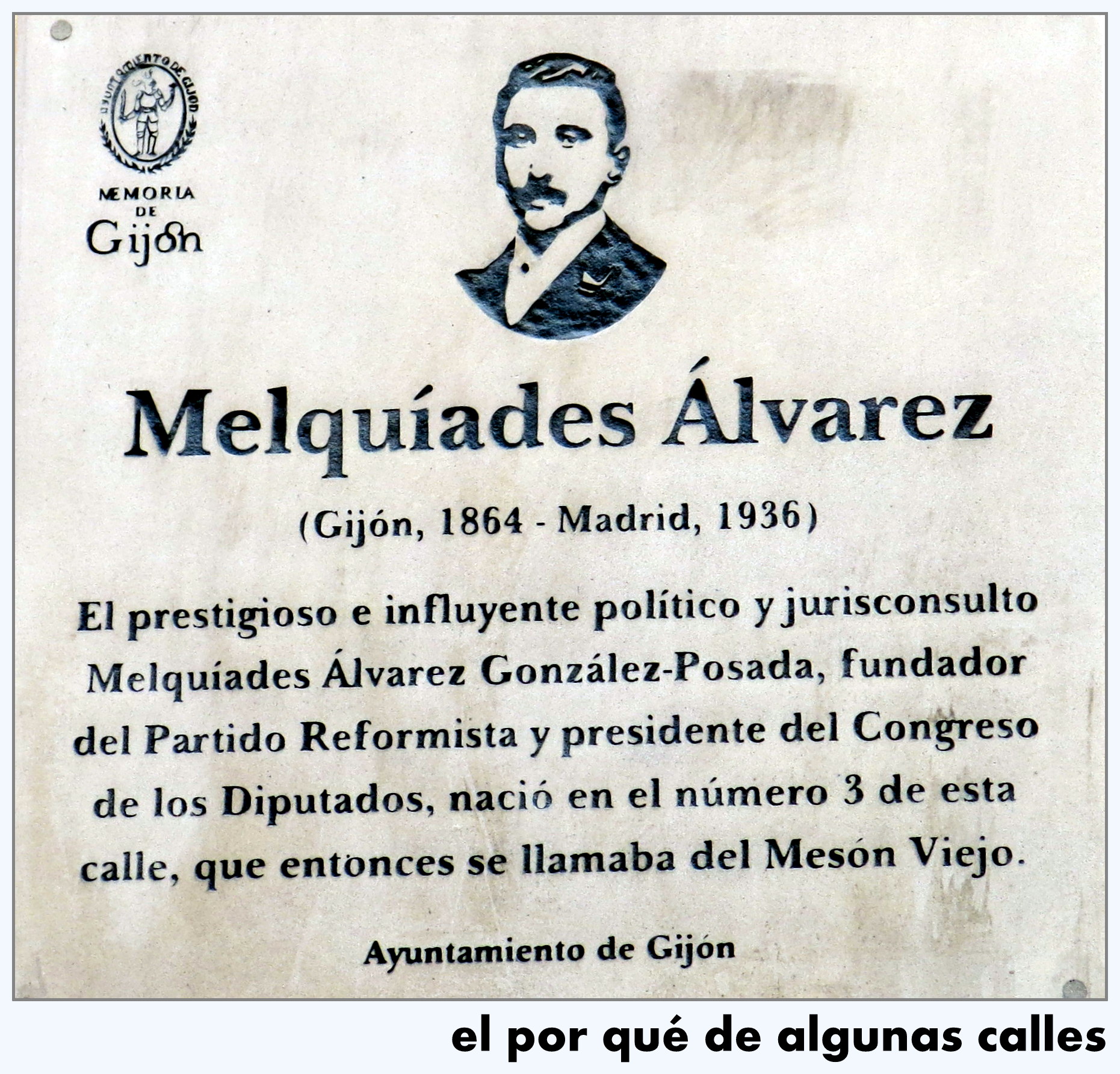 a plaque with a po of a man in black