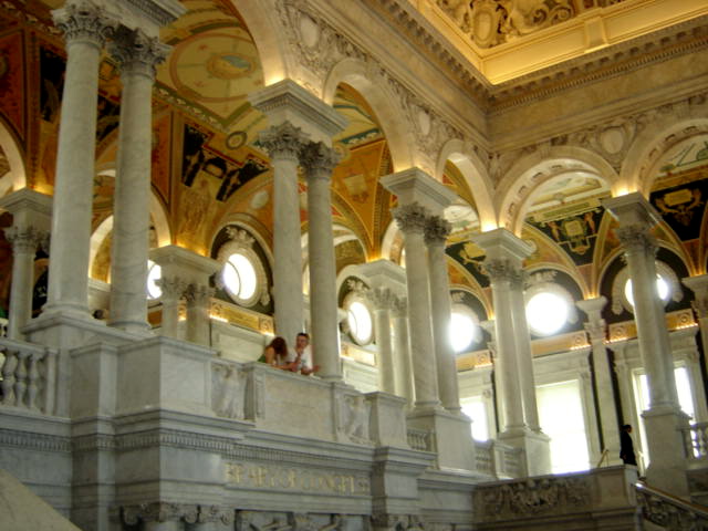 an ornate, elaborate building features many marble columns