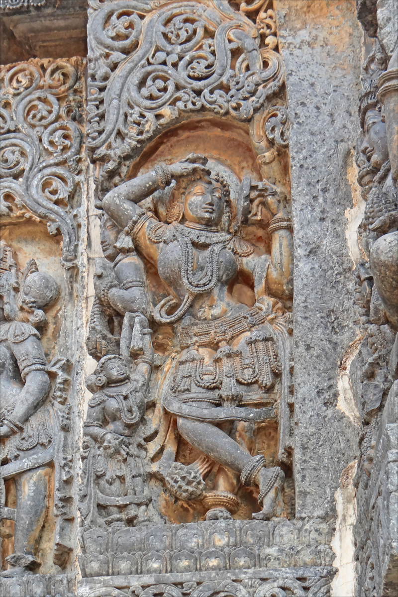 an elaborately carved carving at the entrance to a temple