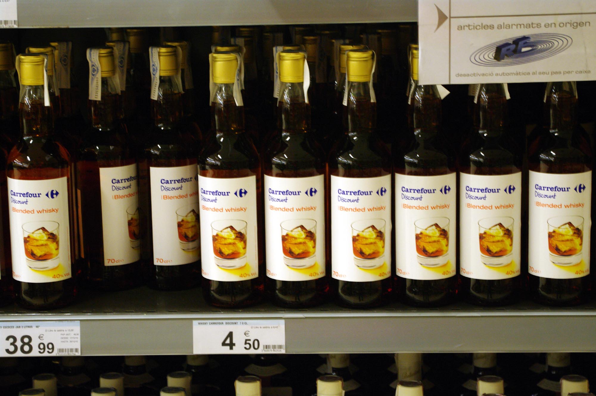 an image of many bottles of wine on a shelf