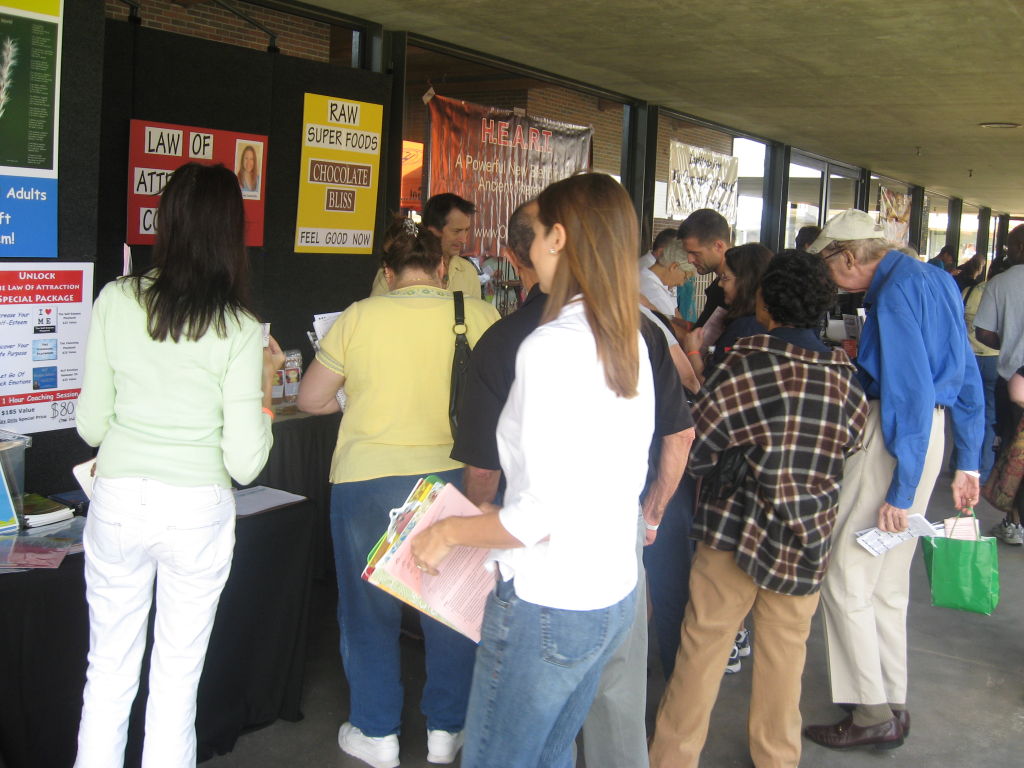 a large group of people at a book fair