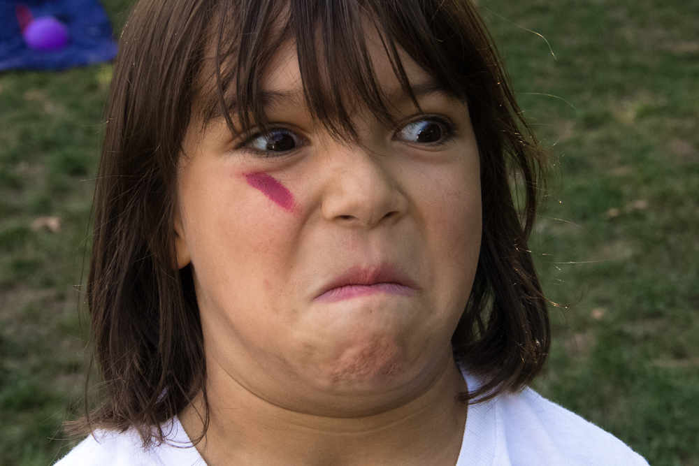  with the name on her face has been marked with pink