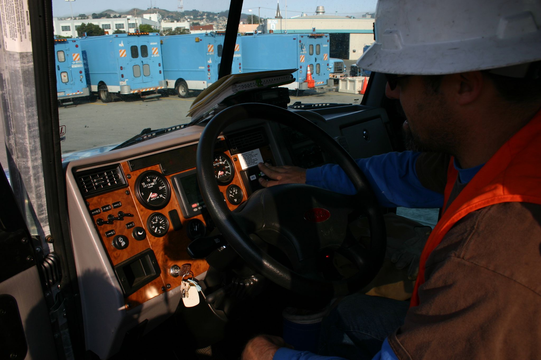 a truck driver is preparing to load a load