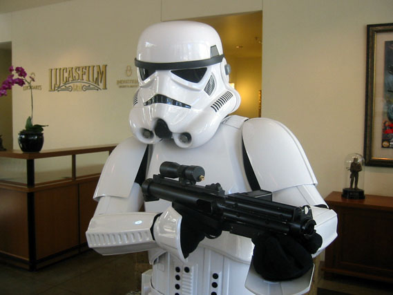a man wearing a white storm trooper costume