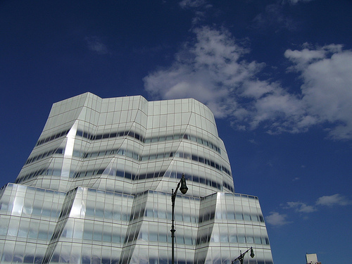 a tall building with many windows is shown