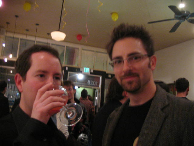 a couple of people that are holding wine glasses