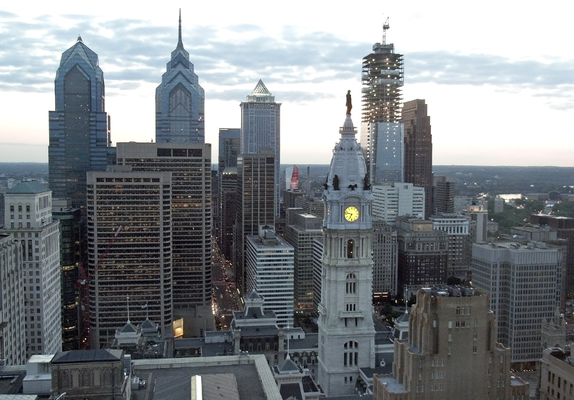 large buildings in a city with sky in the background