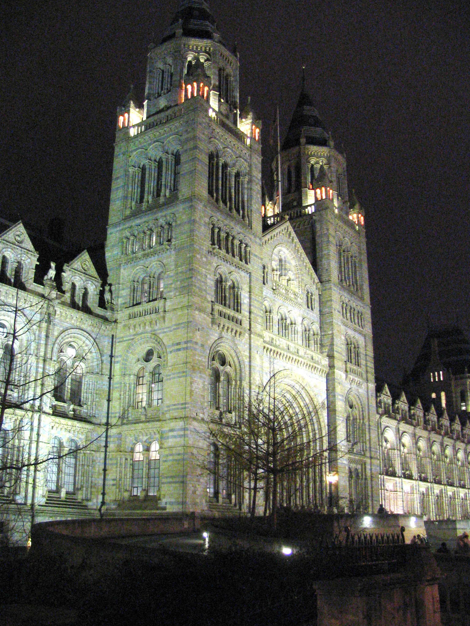 an illuminated po of an old building at night