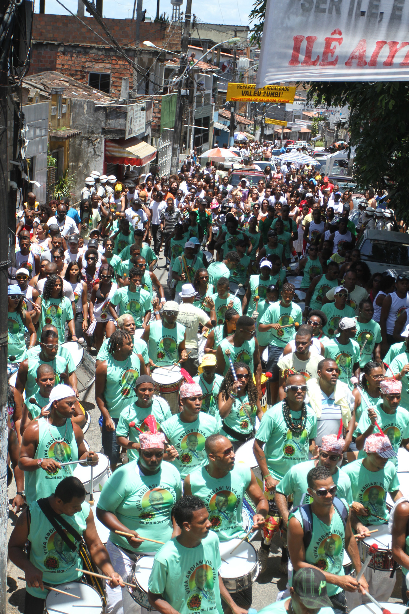 the large group of people are taking part in the parade