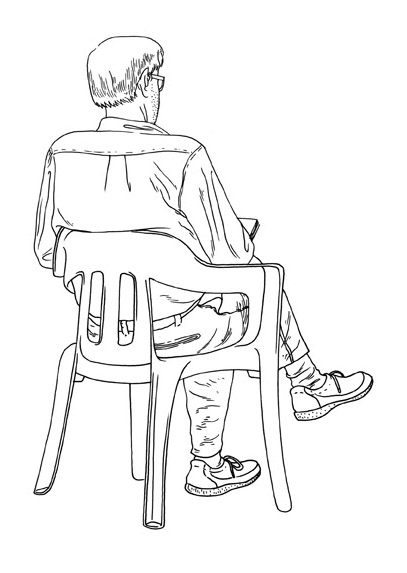 a man sitting on a chair in the middle of his drawing
