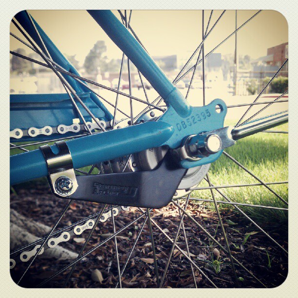 the front wheel of a bicycle with two rear gear