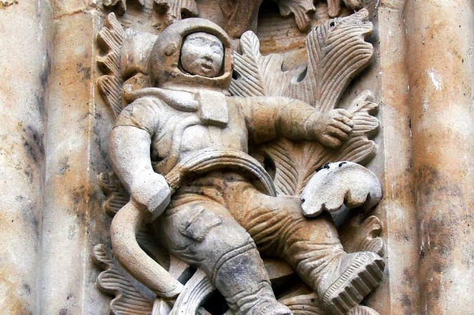 a sculpture depicting a man as he rides a horse