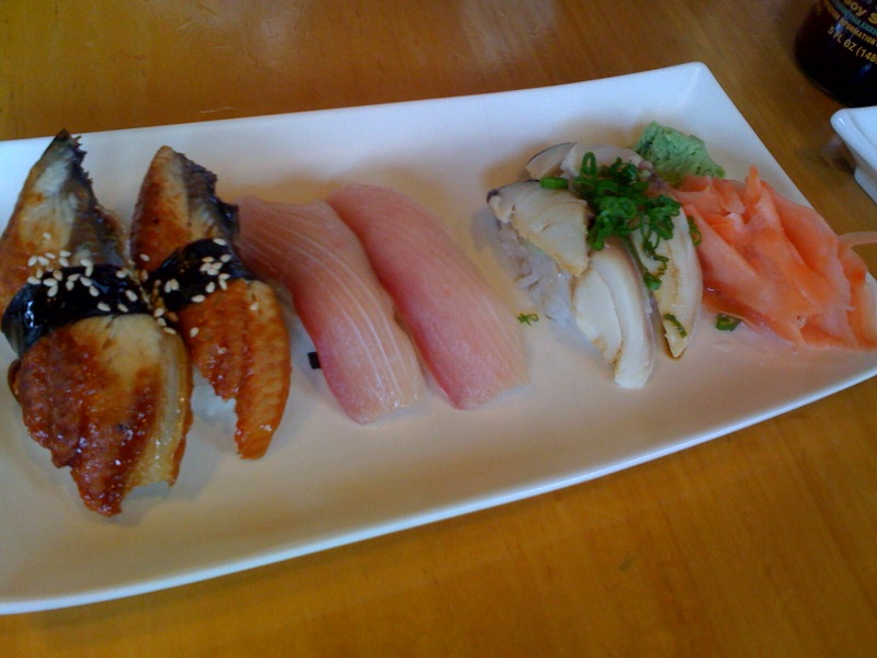 assortment of different kinds of sushi on a plate