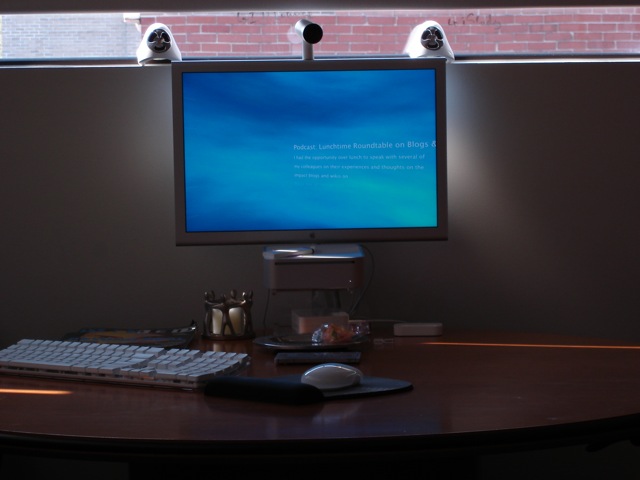 a desktop computer is on top of the desk