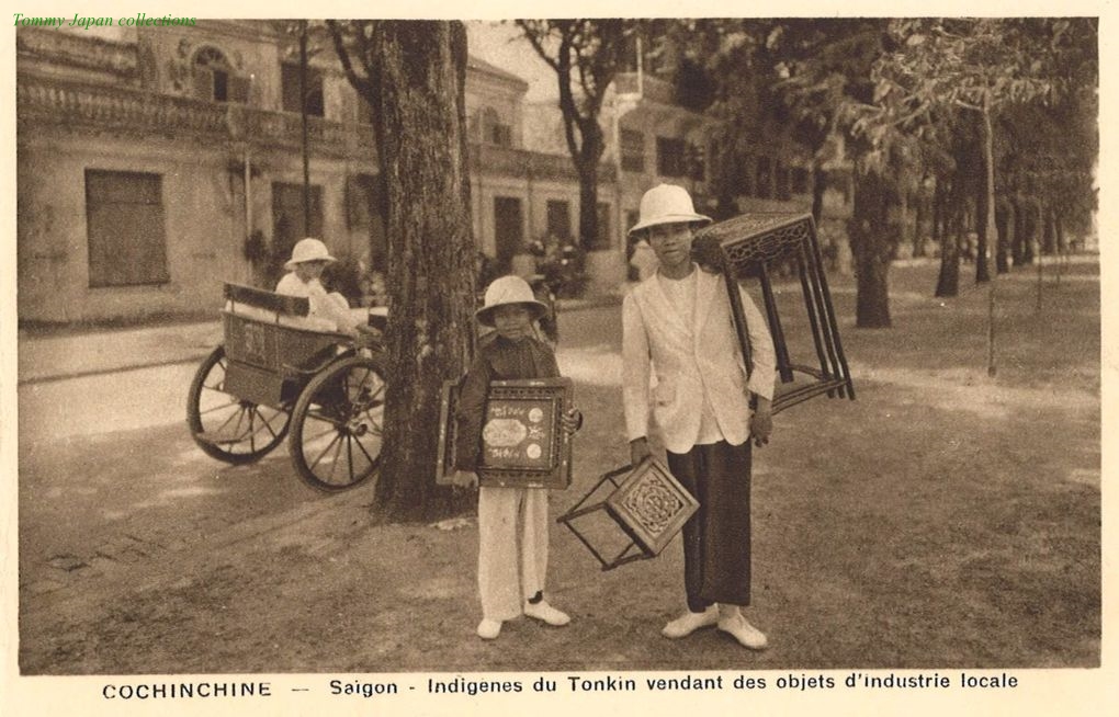 an old po shows a man holding up many items
