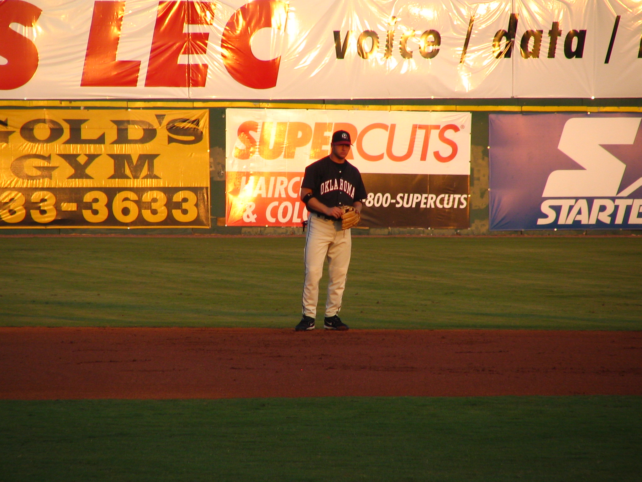 the pitcher stands at the end of the field
