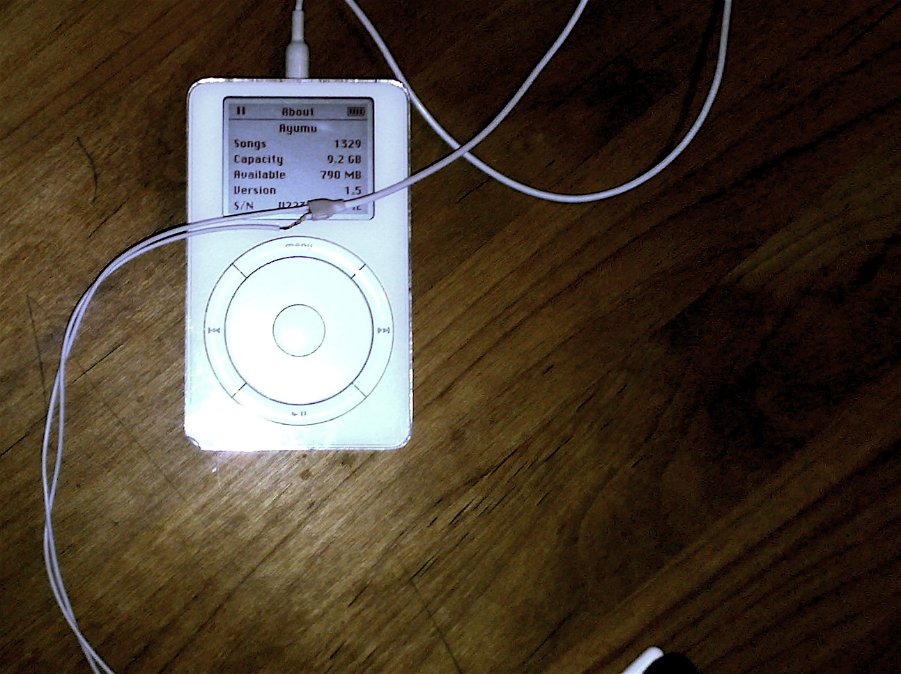 the ipod is connected to a small charger