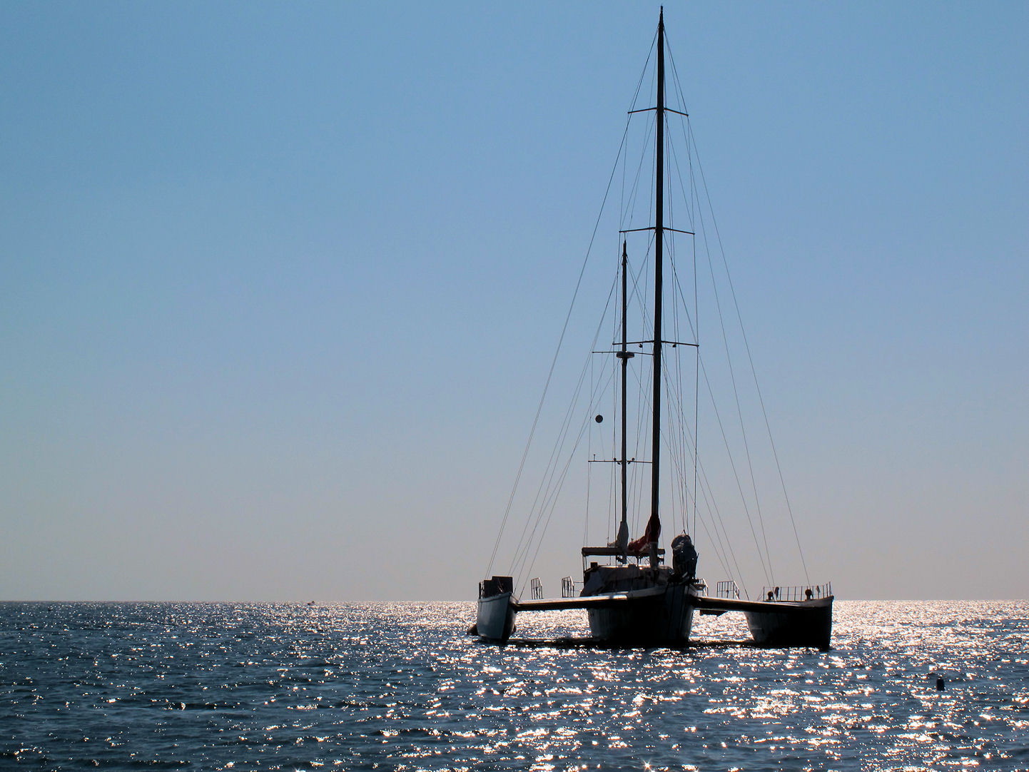 a boat is anchored out in the ocean