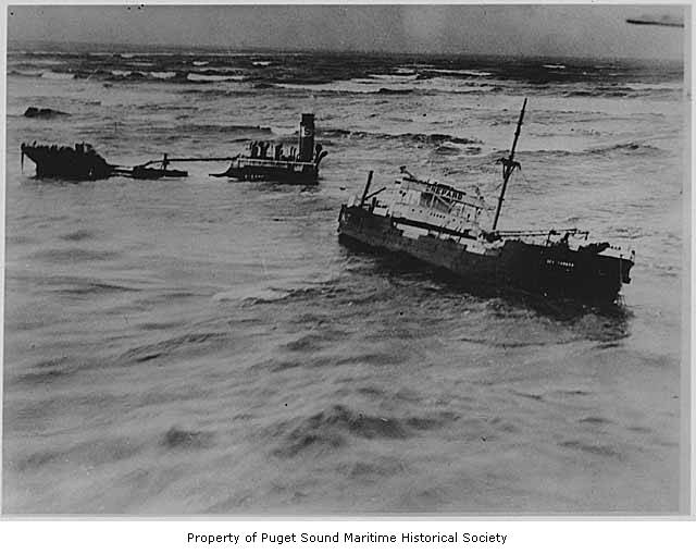 a black and white po of a ship sailing in choppy water