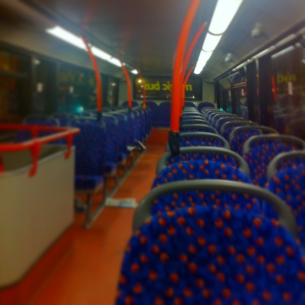 empty seats and seats on a public transit train