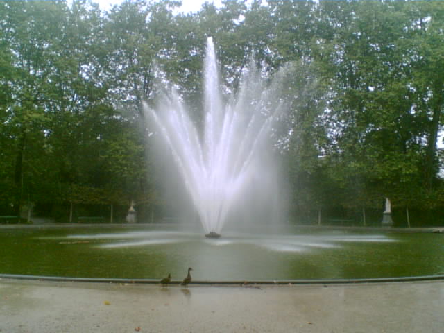 a large fountain with water spraying from it